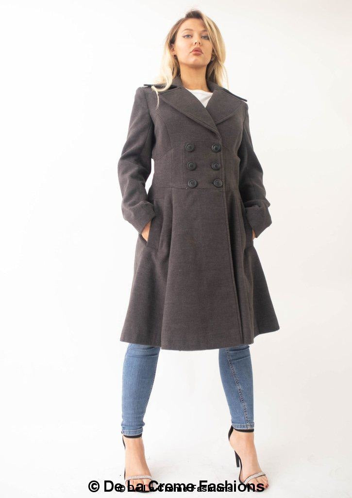Kirsty Slim Fit A-Line Coat in Black, showcasing double breasted fastening and roll collared V-neckline.