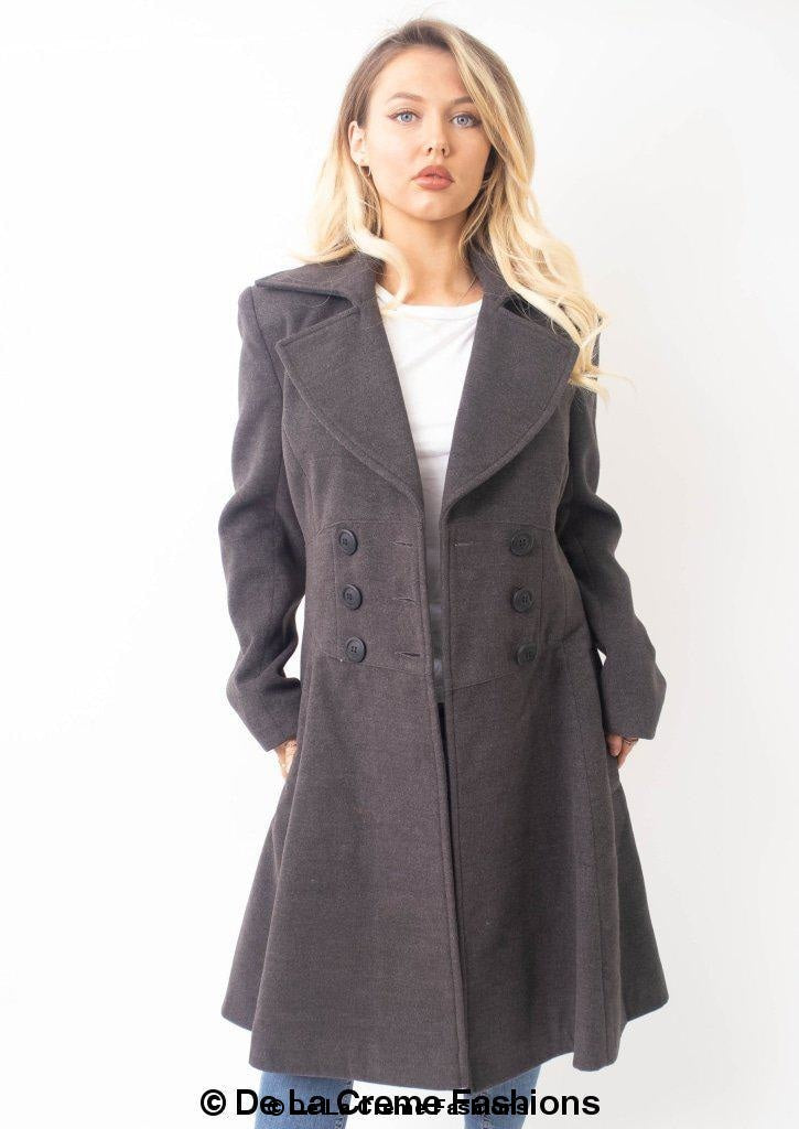 Kirsty Slim Fit A-Line Coat in Black, showcasing double breasted fastening and roll collared V-neckline.