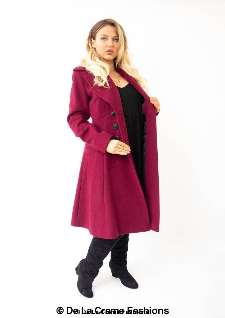 Kirsty Slim Fit A-Line Coat in Black, showcasing double breasted fastening and roll collared V-neckline.
