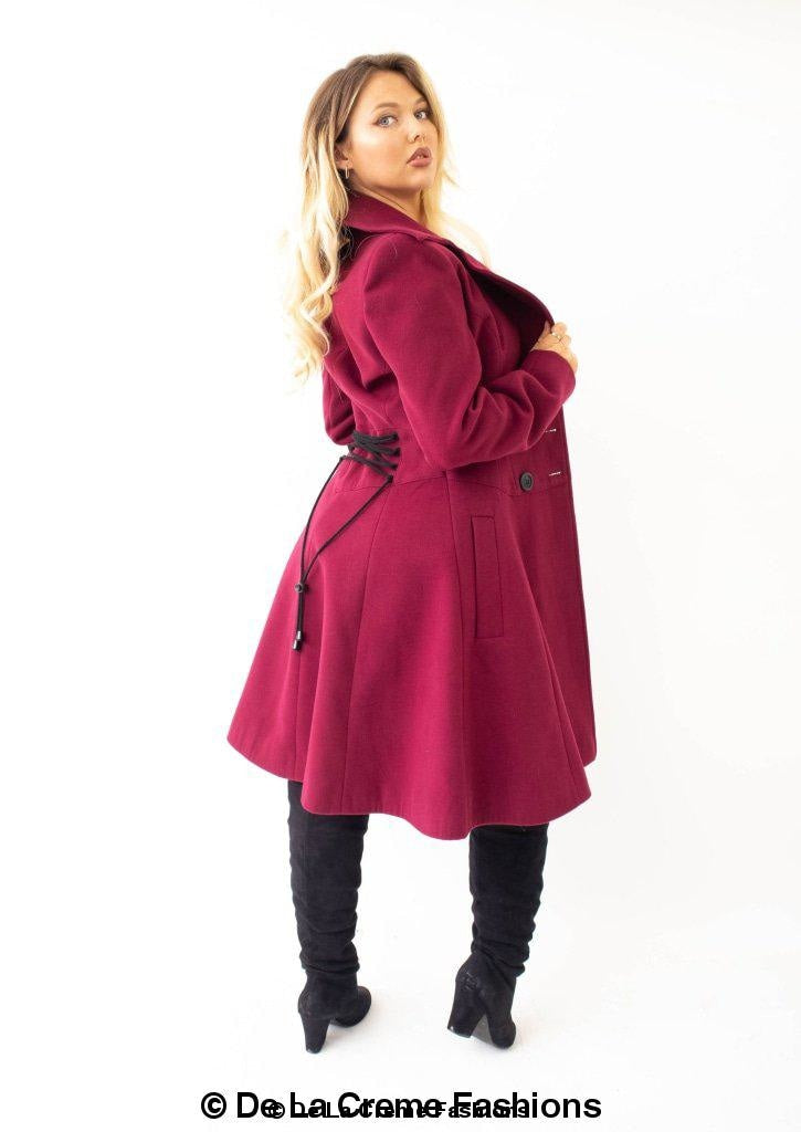 Kirsty Slim Fit A-Line Coat in Black, showcasing double breasted fastening and roll collared V-neckline.