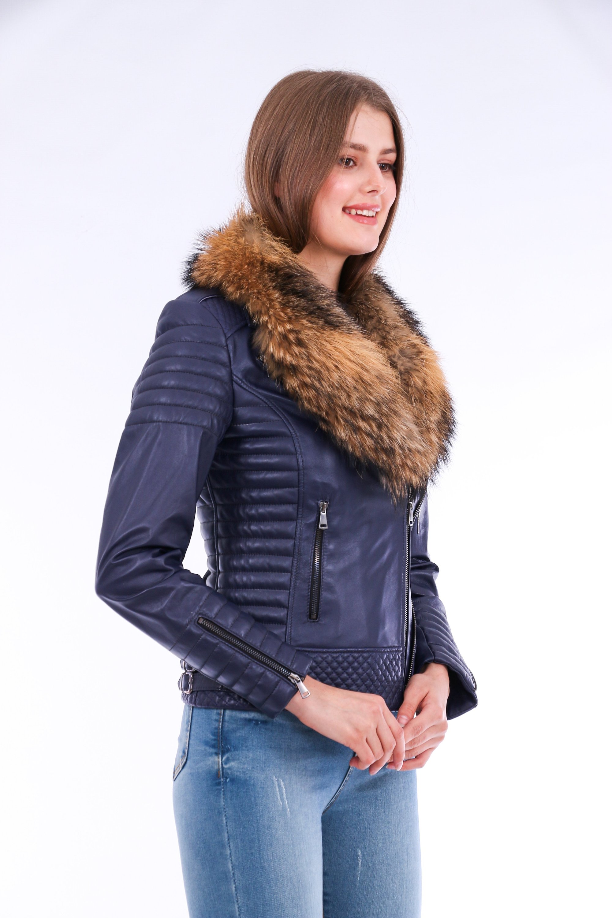 Milani Quilted Leather Biker Jacket in Navy Blue featuring a detachable fur collar and zipper pockets, showcasing premium soft leather.