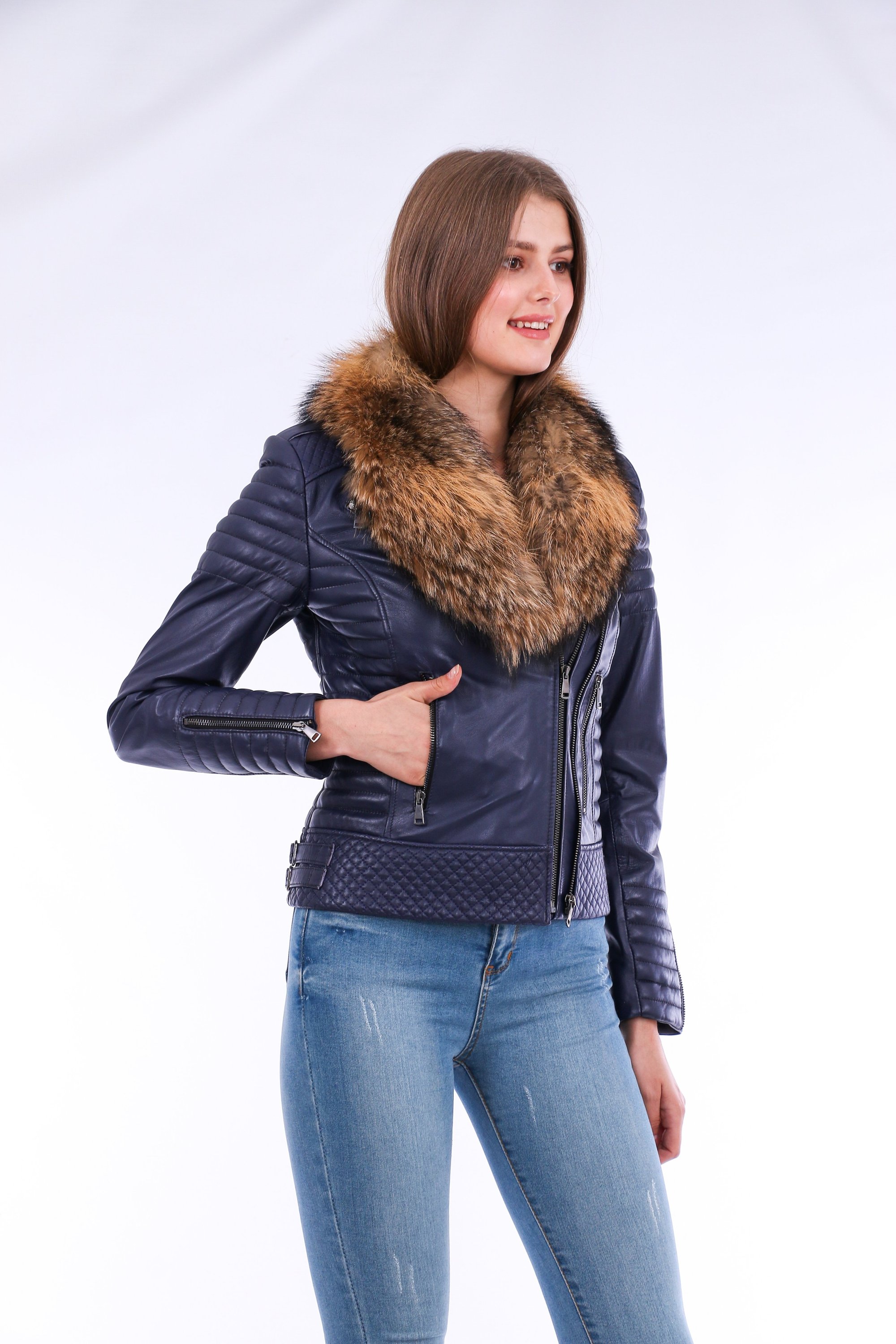 Milani Quilted Leather Biker Jacket in Navy Blue featuring a detachable fur collar and zipper pockets, showcasing premium soft leather.