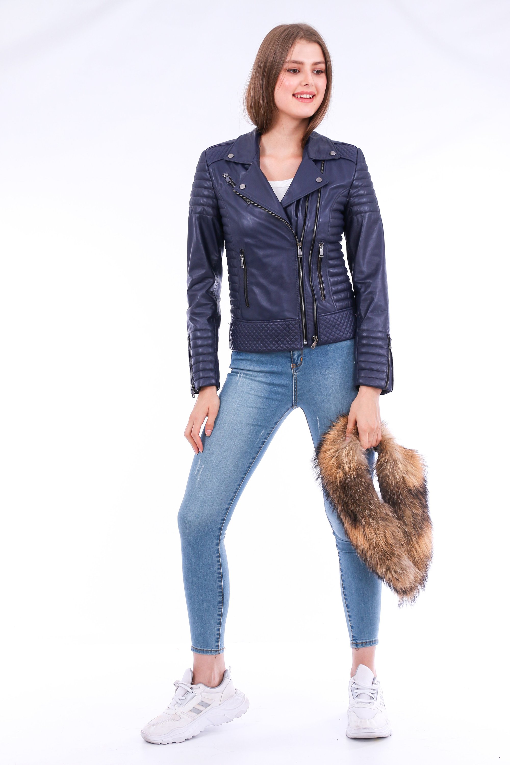 Milani Quilted Leather Biker Jacket in Navy Blue featuring a detachable fur collar and zipper pockets, showcasing premium soft leather.