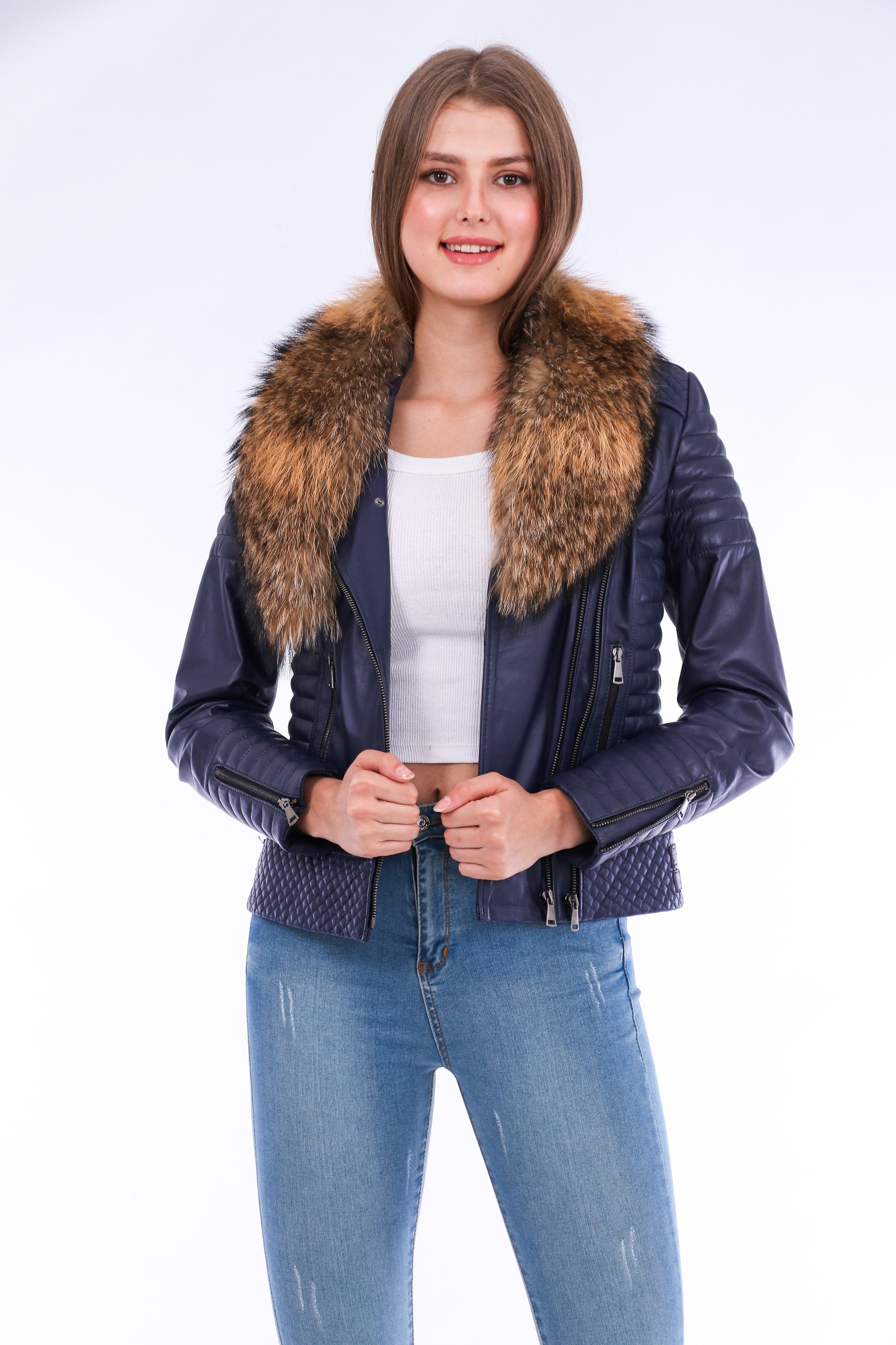 Milani Quilted Leather Biker Jacket in Navy Blue featuring a detachable fur collar and zipper pockets, showcasing premium soft leather.