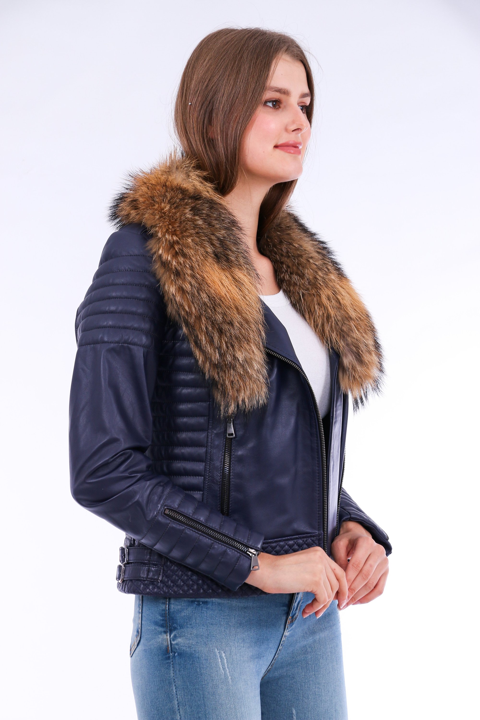 Milani Quilted Leather Biker Jacket in Navy Blue featuring a detachable fur collar and zipper pockets, showcasing premium soft leather.