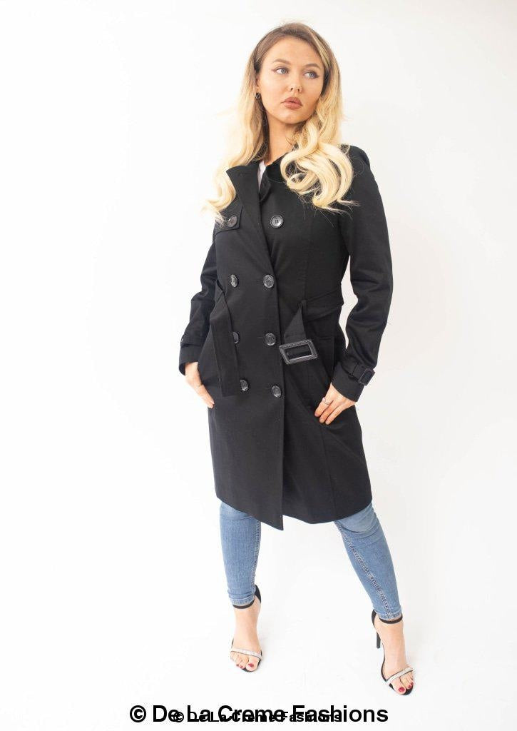 A stylish Slim Fit Lightweight Trench Coat in black, featuring double-breasted fastening and two side pockets, perfect for layering.
