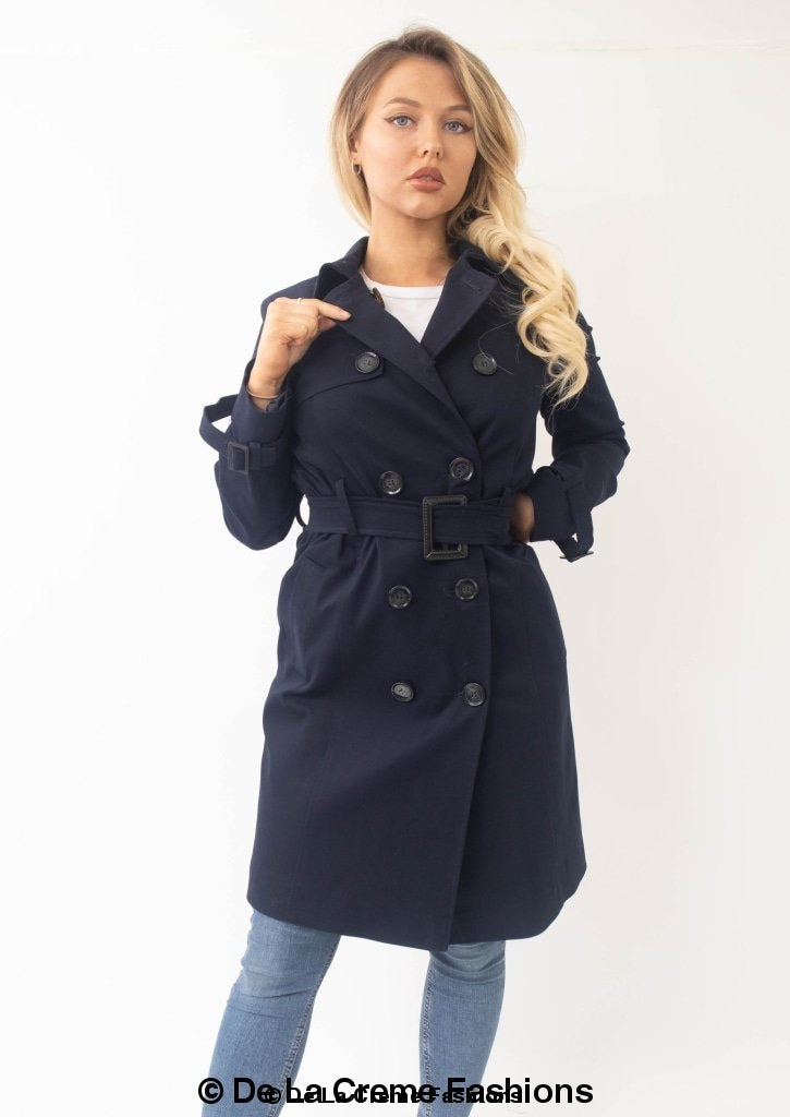 A stylish Slim Fit Lightweight Trench Coat in black, featuring double-breasted fastening and two side pockets, perfect for layering.