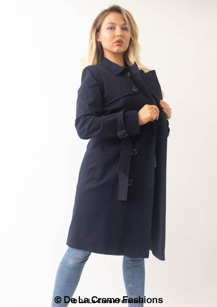 A stylish Slim Fit Lightweight Trench Coat in black, featuring double-breasted fastening and two side pockets, perfect for layering.