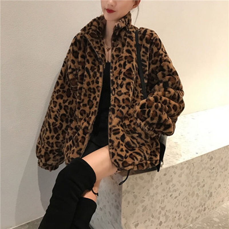 A stylish women's winter leopard print jacket featuring a stand collar, faux fur material, and convenient pockets, perfect for casual outings.