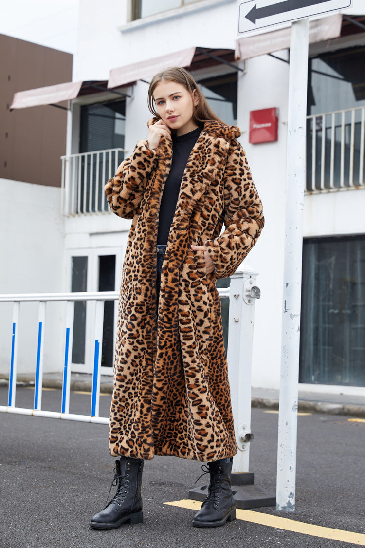 A stylish Winter Women's Faux Fur Leopard Print Coat with a tailored collar, showcasing its luxurious faux fur texture and trendy design.