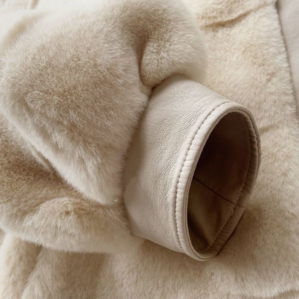 Women's Faux Fur Jacket with Vegan Leather Trimmed Cuffs in white, showcasing soft faux fur and stylish cuffs.