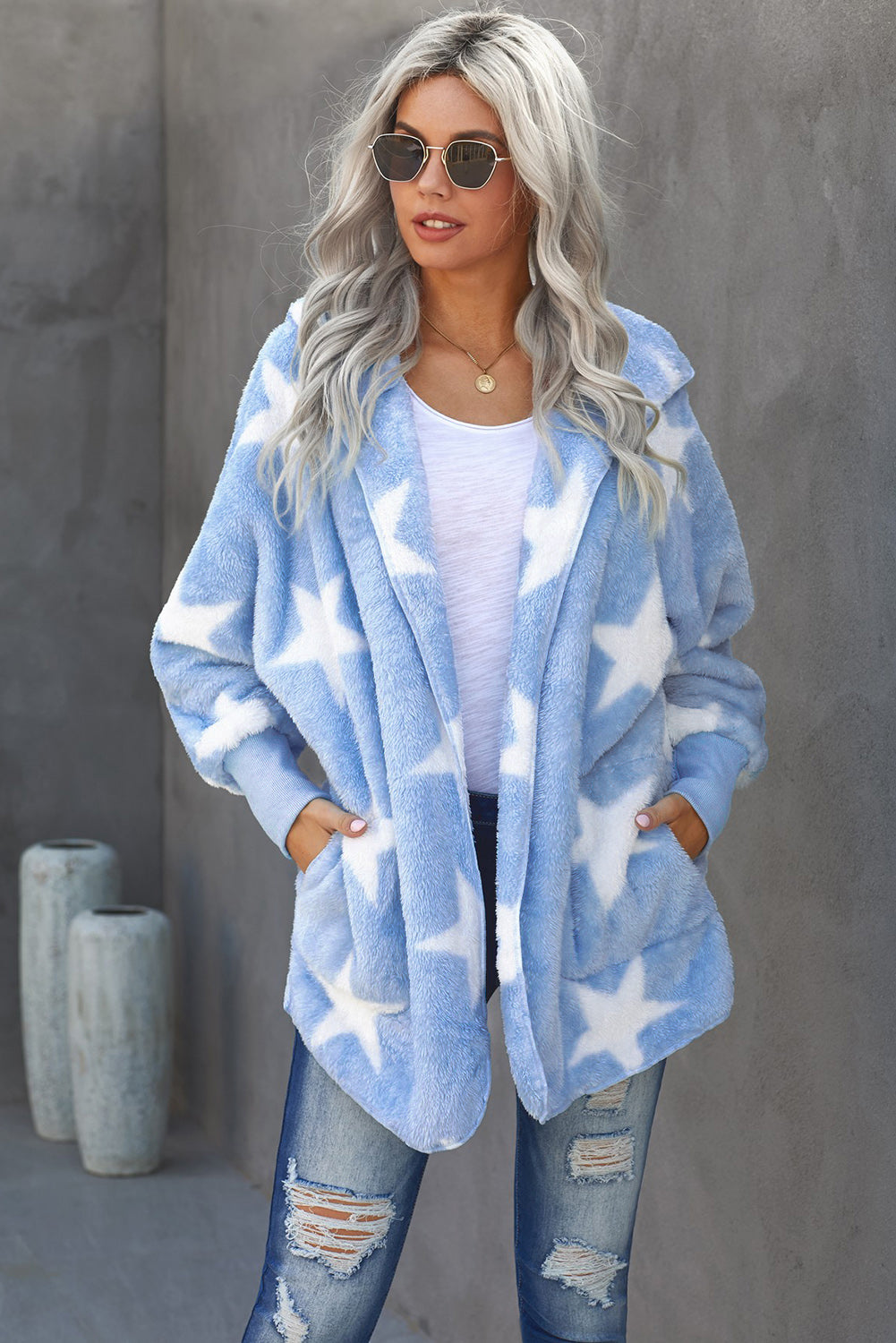 Women’s Sky Blue Lapel Collar Scatter Star Fuzzy Coat featuring a soft fuzzy texture, elegant lapel collar, and scattered star print design.