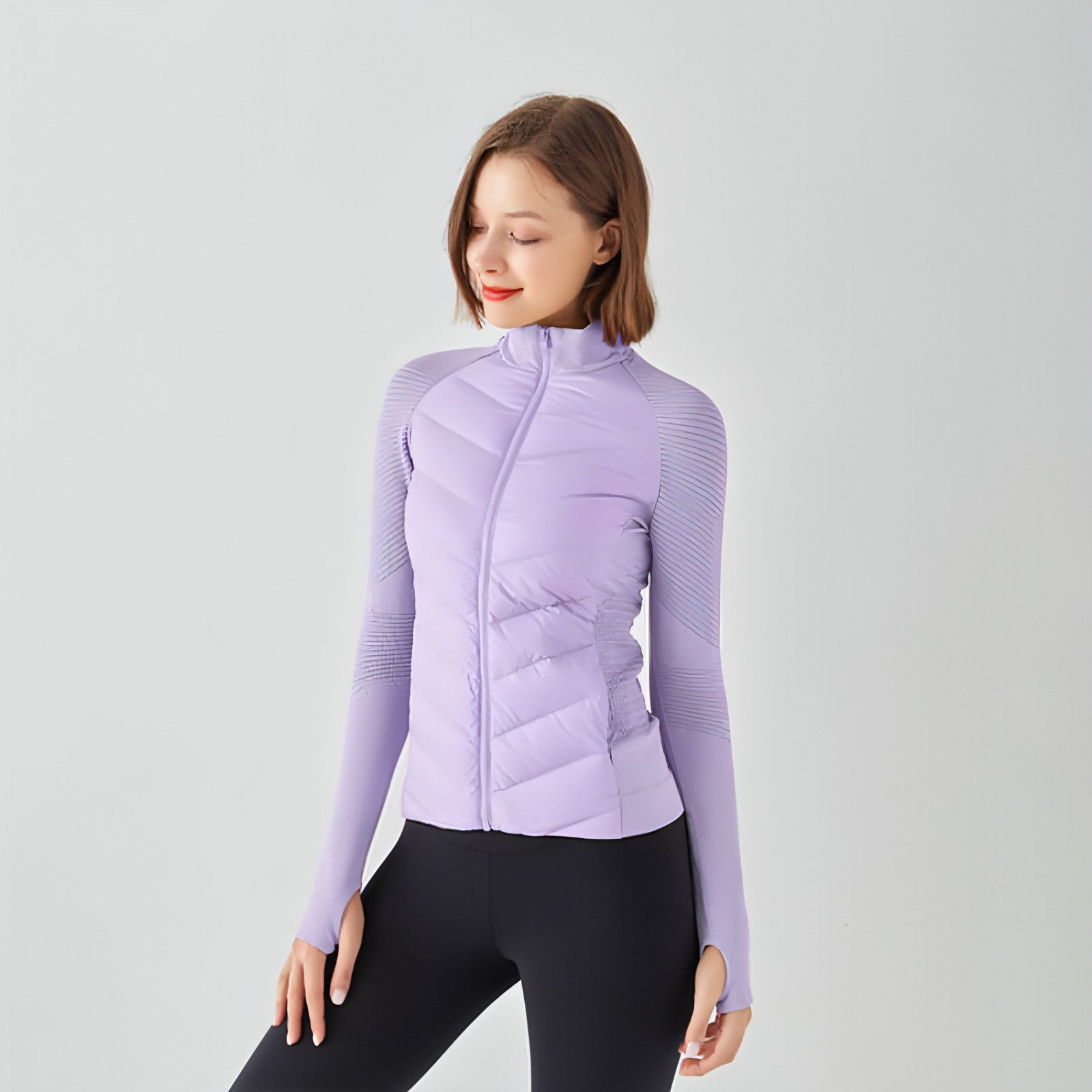 A stylish Yoga Sports Down Jacket for Women, featuring a lightweight design, adjustable hood, and multiple pockets, perfect for outdoor activities.