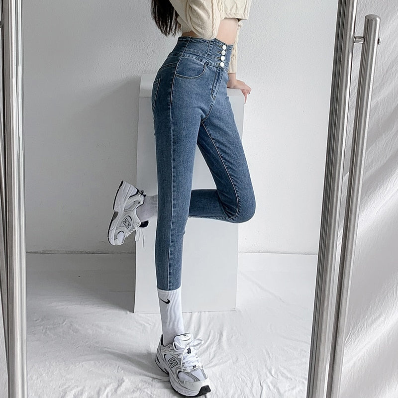 Skinny Pencil Jeans with Four Buttons, featuring a vintage high waist design and light wash finish, perfect for stylish women.
