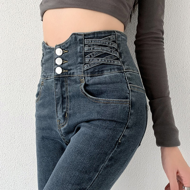 Skinny Pencil Jeans with Four Buttons, featuring a vintage high waist design and light wash finish, perfect for stylish women.