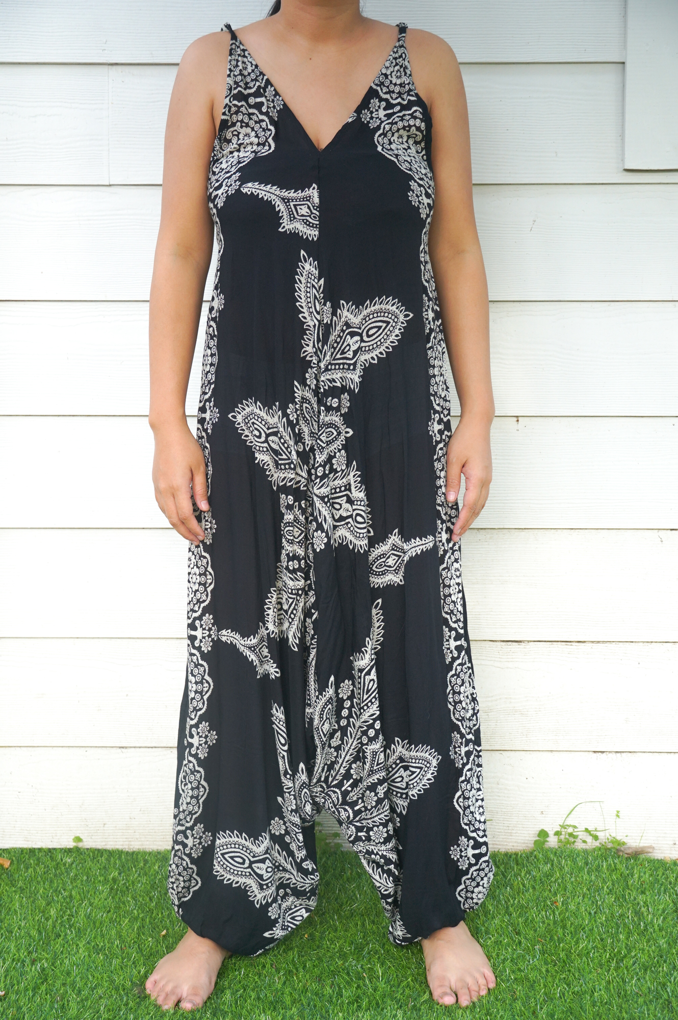 Black Butterfly Hippie Jumpsuit featuring wide legs and adjustable straps, perfect for festivals and summer wear.