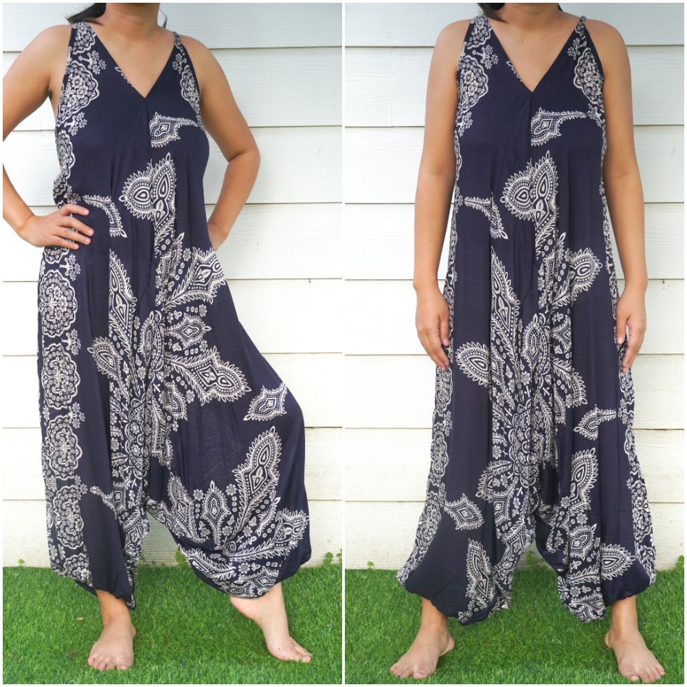 A vibrant blue butterfly hippie jumpsuit with wide legs, adjustable straps, and elasticated back, perfect for summer festivals.
