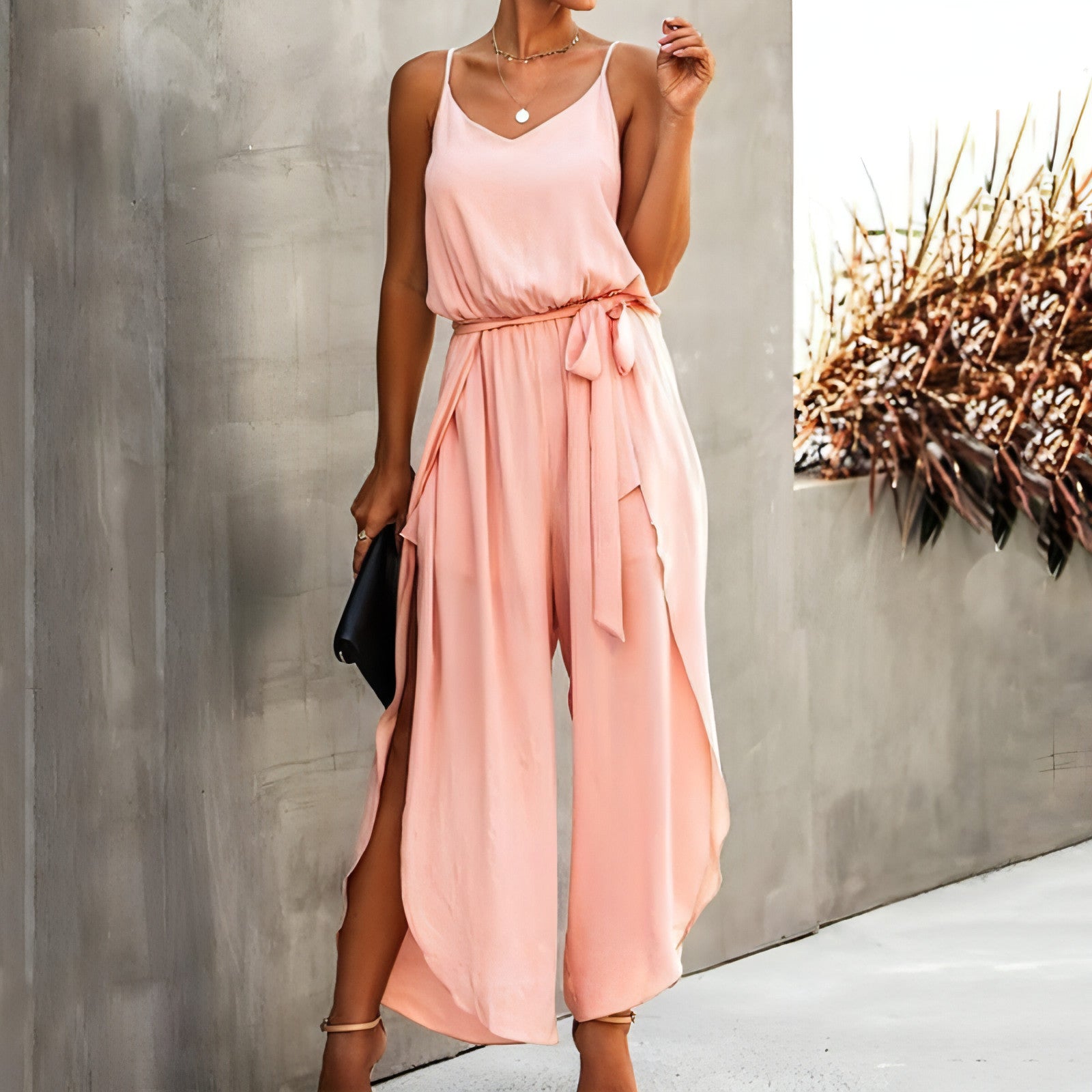 A stylish side split female jumpsuit showcasing elegance and comfort, perfect for various occasions.