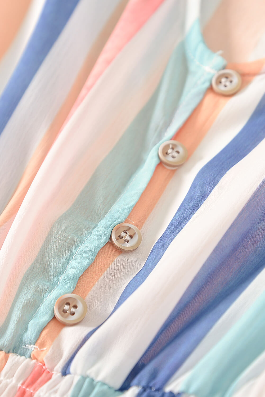 A stylish Summer Striped Print V-neck Button Romper featuring a multicolor striped pattern, short sleeves, and a buttoned front detail, perfect for summer outings.