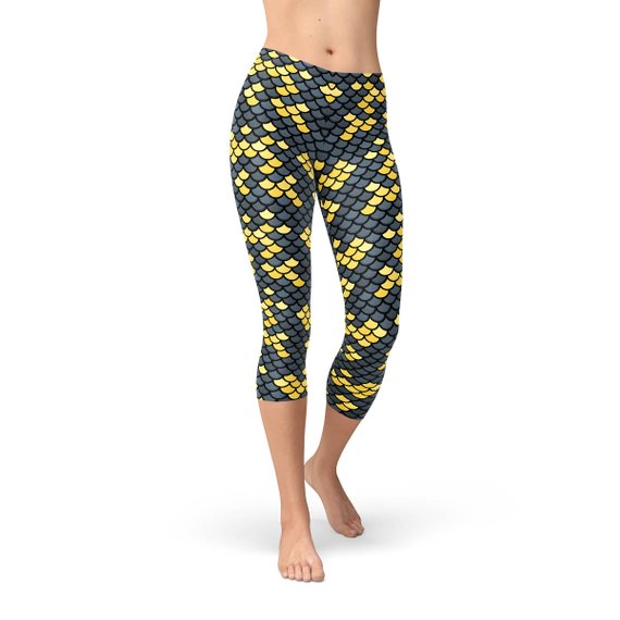 Mermaid Capri Leggings for Women featuring dark gray and yellow fish scales, designed for comfort and performance during workouts.