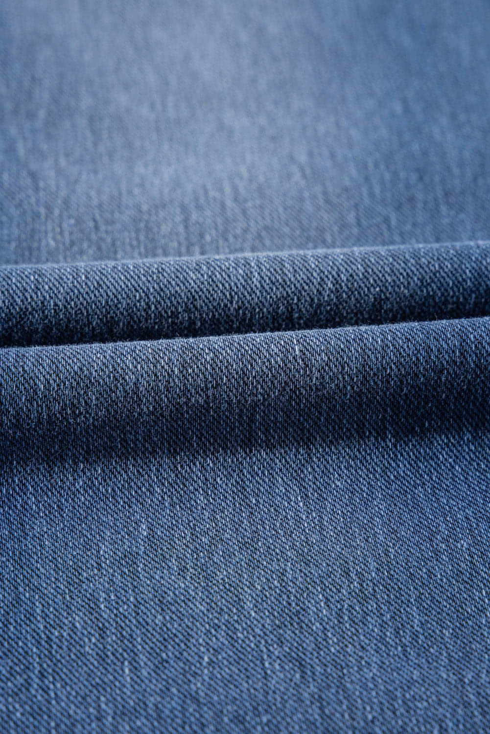 Navy blue skinny jeggings with elastic waistband, ankle length, and functional pockets, perfect for stylish comfort.