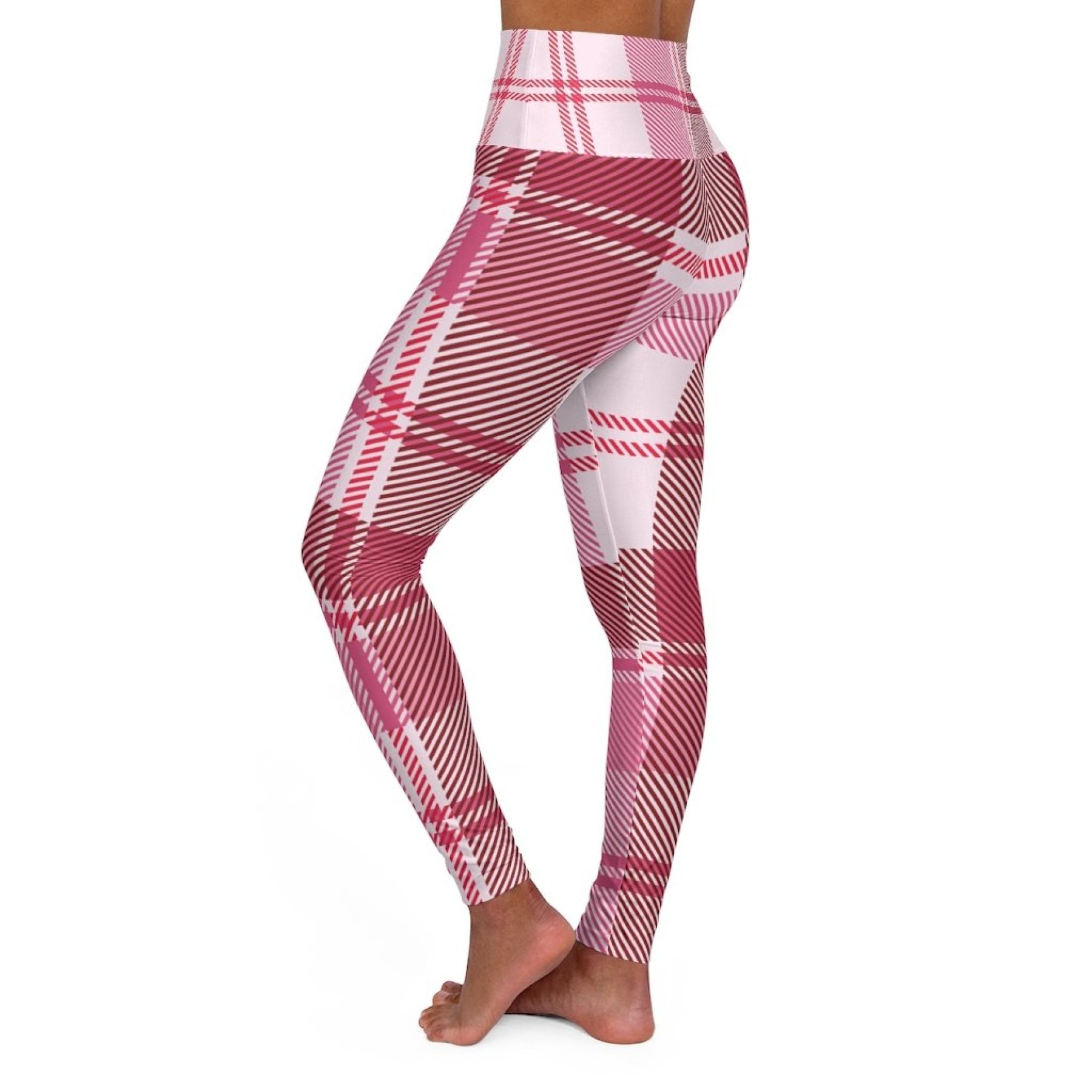 Women's high waist fitness leggings in pink plaid, showcasing a stylish design and comfortable fit, perfect for workouts and yoga.