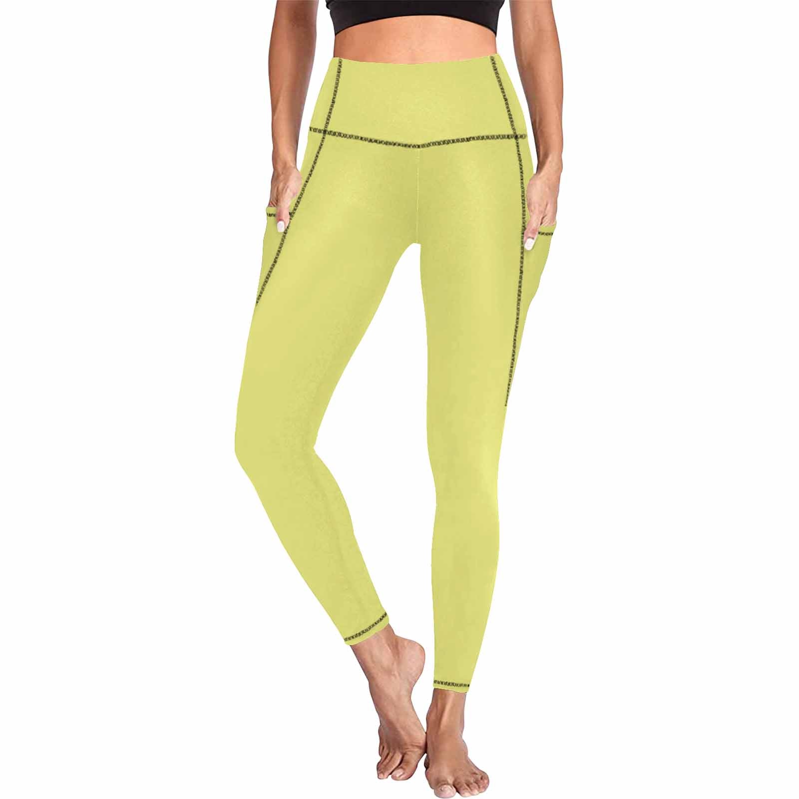 A pair of women's honeysuckle yellow leggings with side pockets, showcasing a stylish and comfortable design for fitness and casual wear.