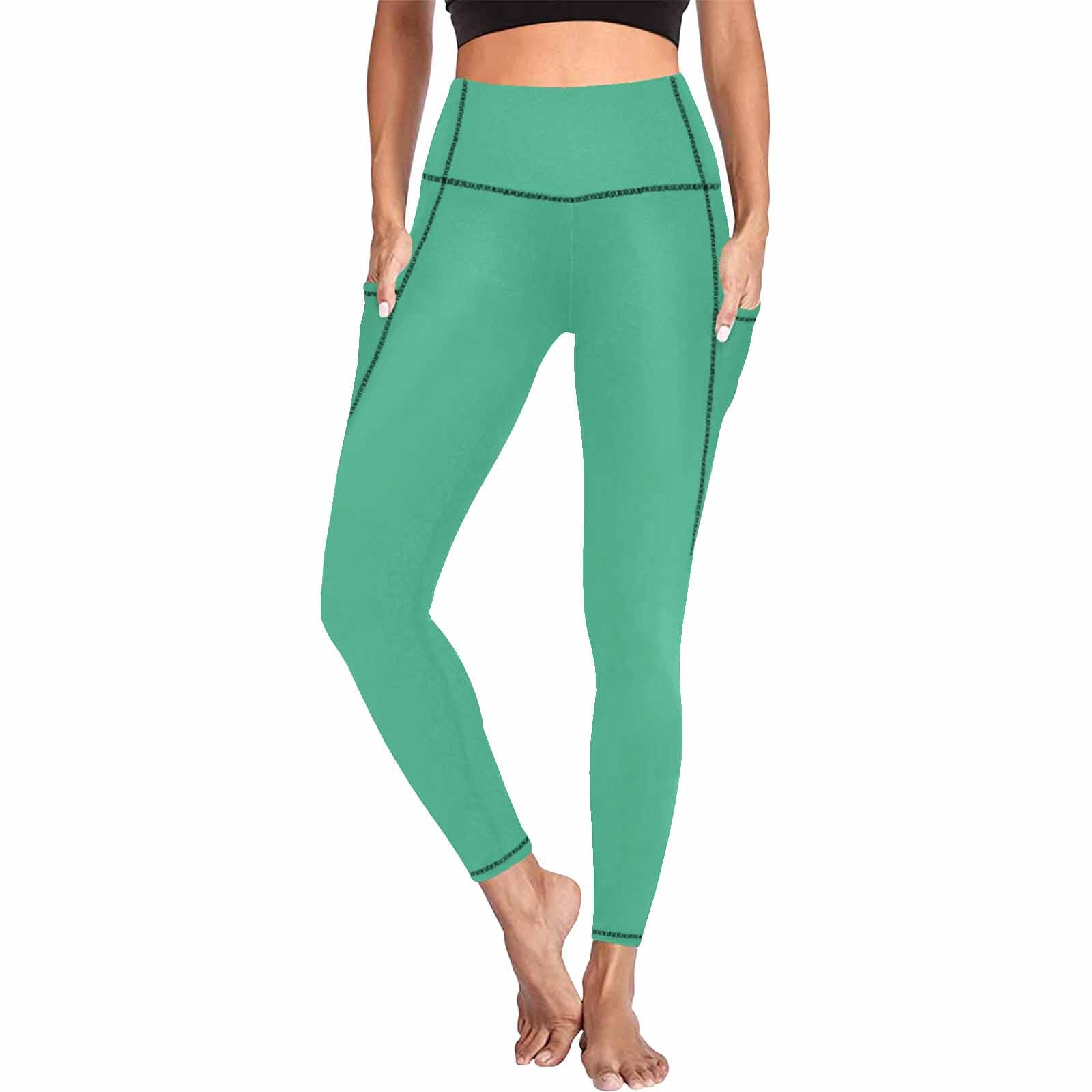 Mint green women's leggings with pockets, showcasing a soft and lightweight fabric, perfect for fitness activities.