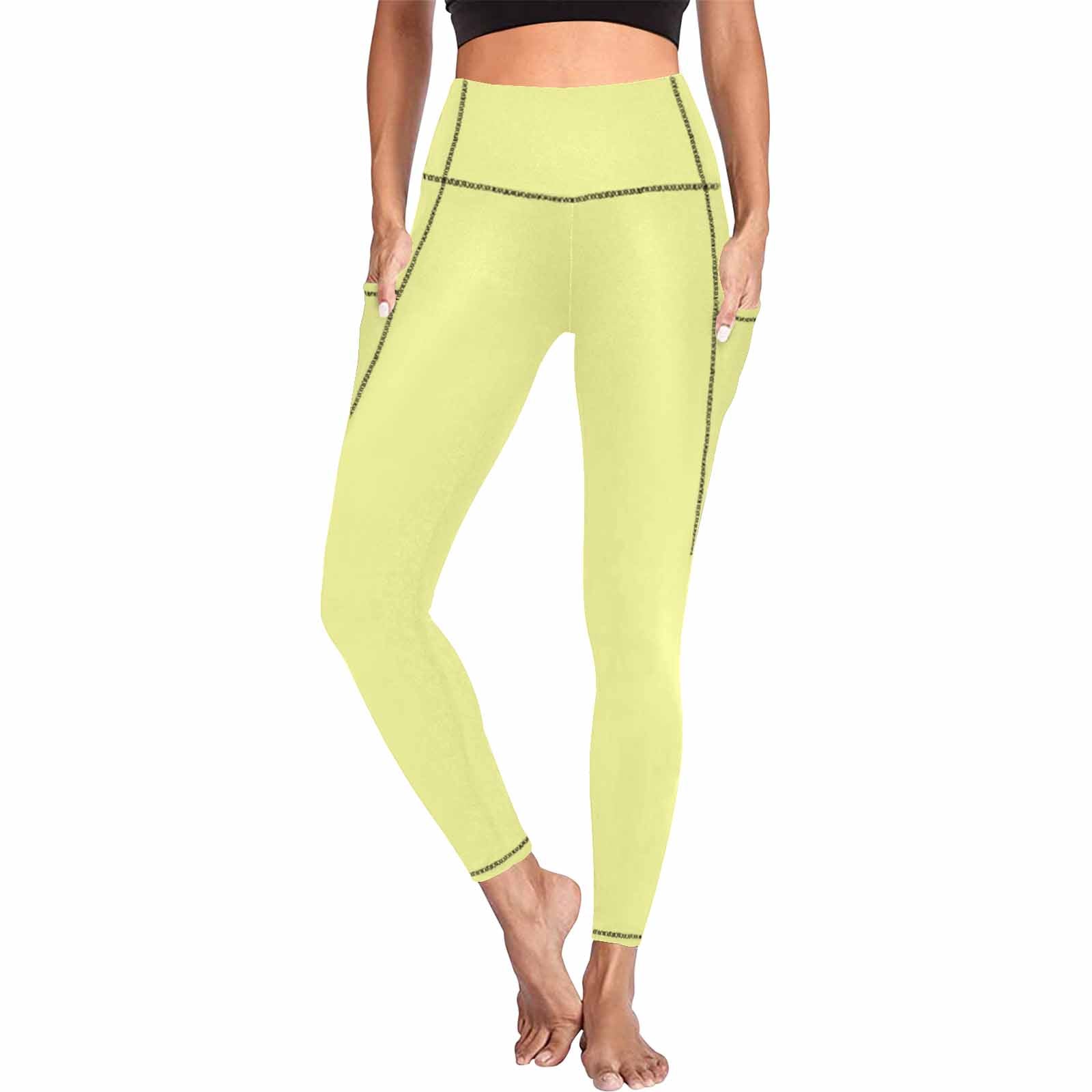 Pastel yellow women's leggings with pockets, showcasing a stylish and functional design for fitness and casual wear.