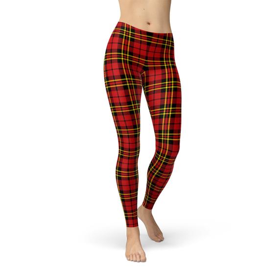 A pair of Women's Red Plaid Tartan Leggings featuring a classic red and black plaid pattern, designed for comfort and style.