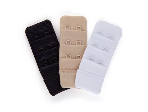 Brah! Extender set featuring three bra extenders in black, white, and beige, made from soft microfiber with nylon-coated hooks.