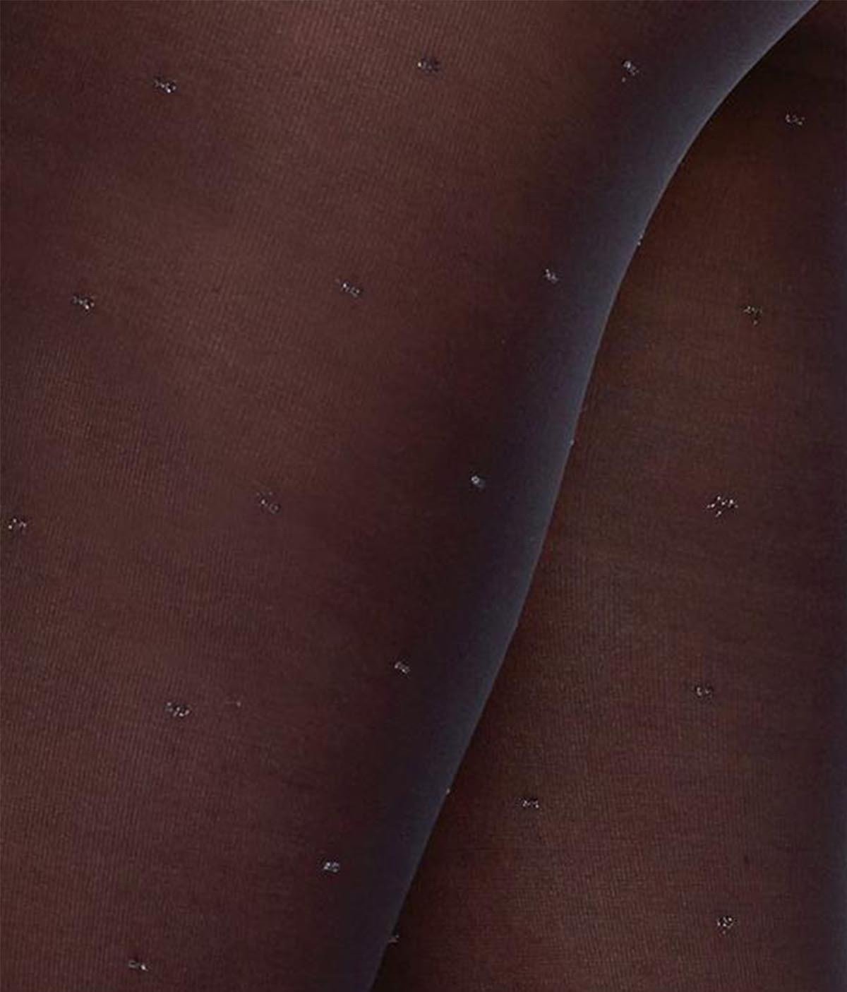 Collants plumetis argenté en polyamide recyclé, noirs avec pois pailletés, parfaits pour les tenues de fête.