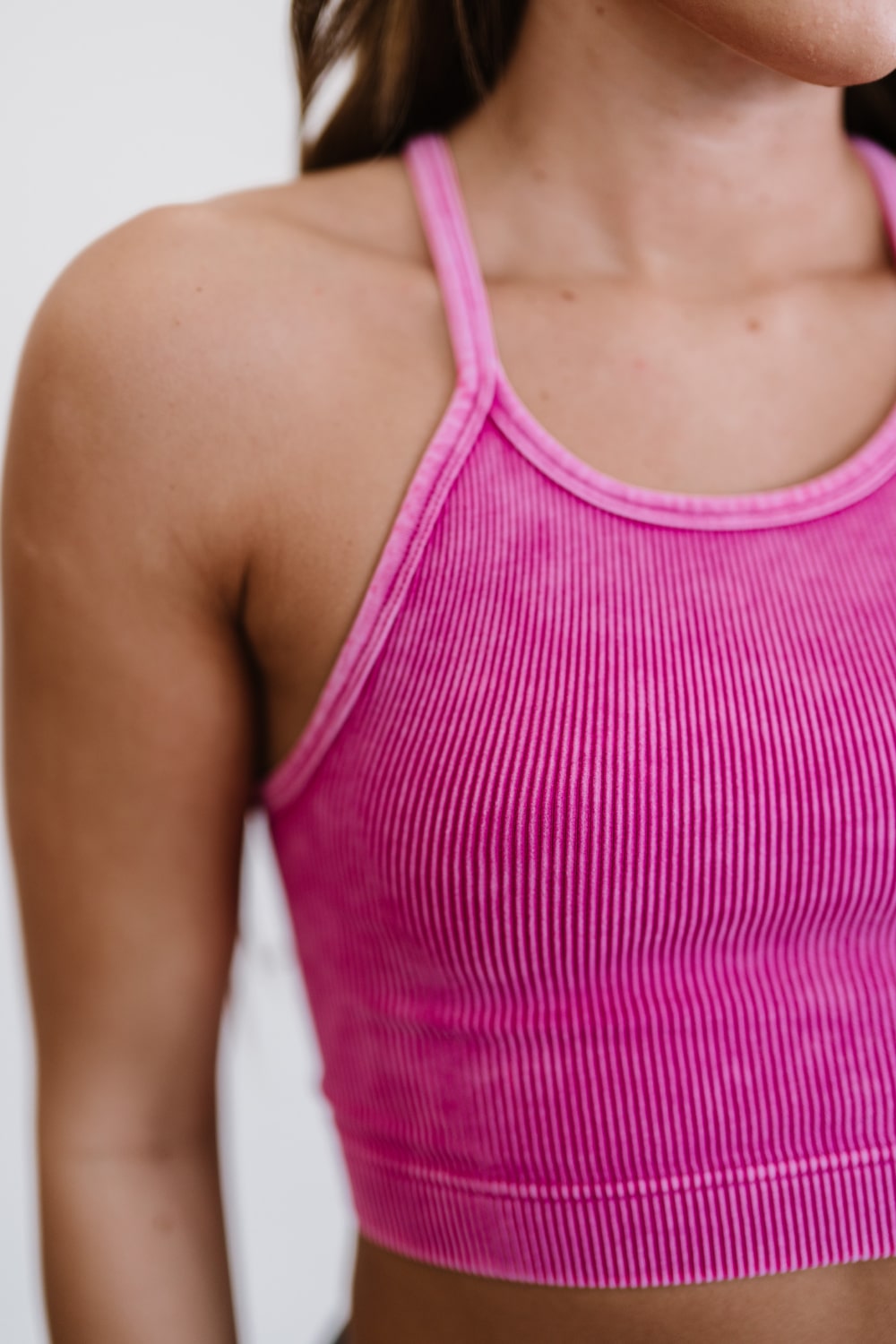 On the Move Ribbed Cropped Cami in mineral wash, showcasing its ribbed texture and round neckline.