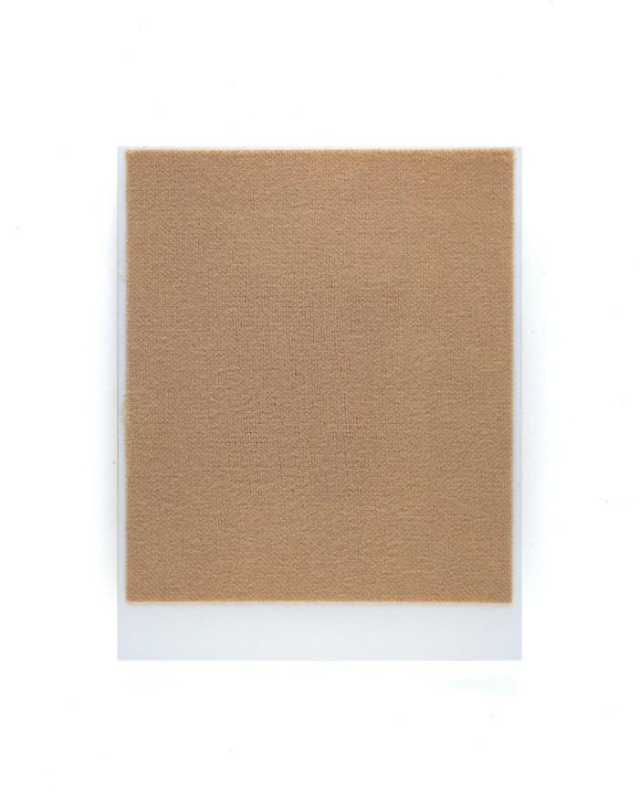 Pocksie temporary sticky pocket in beige, showcasing its adhesive backing and size for secure storage.