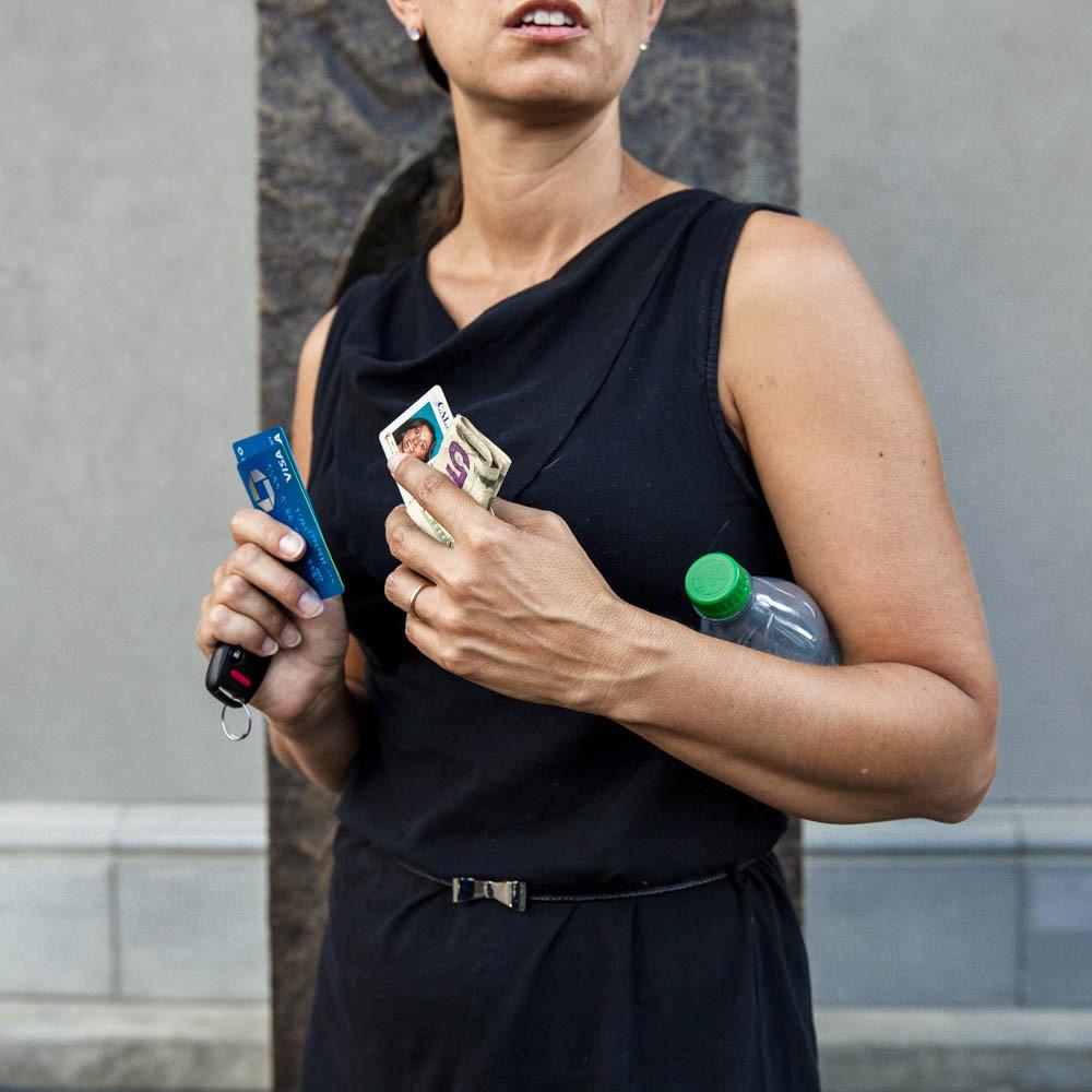 Pocksie temporary sticky pocket in beige, showcasing its adhesive backing and size for secure storage.