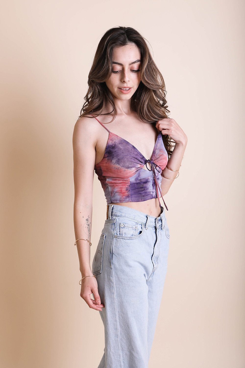 A vibrant Tie Dye Mesh Keyhole Brami featuring colorful patterns, front ties, and a stylish keyhole cutout, perfect for summer wear.