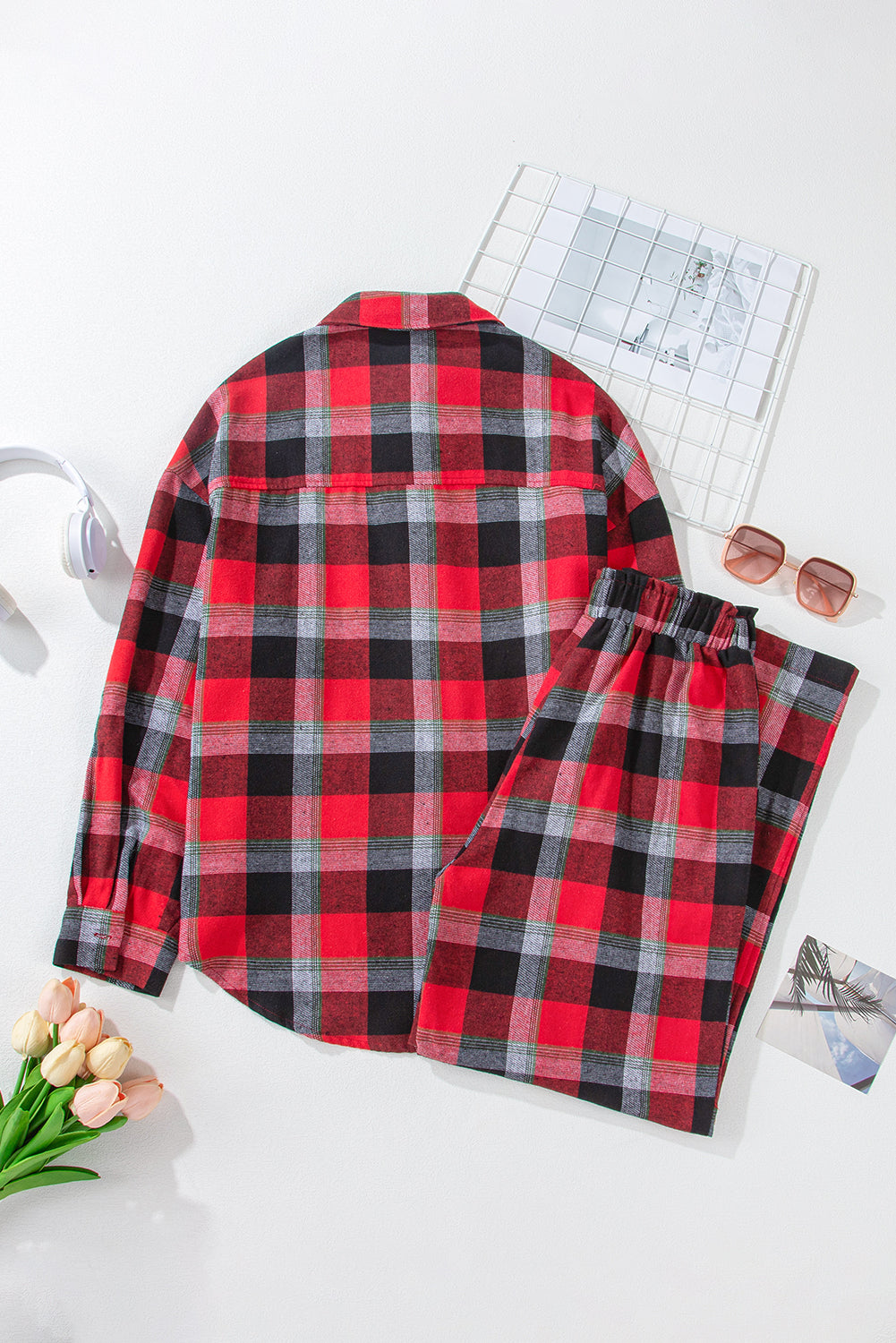 A cozy Christmas plaid shirt and pants lounge set featuring a relaxed fit, perfect for holiday lounging.