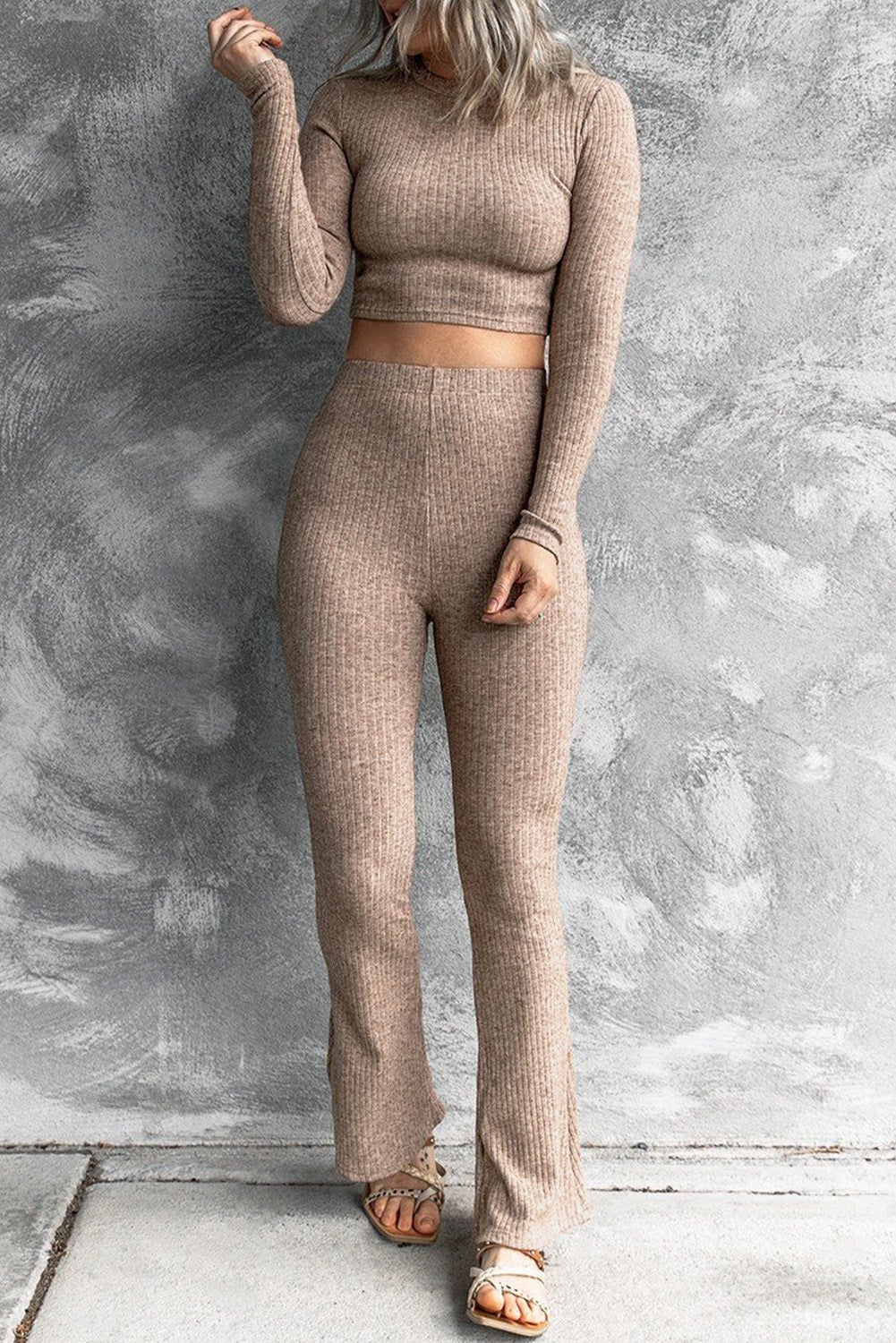A stylish ribbed crop top and high-rise pants set in brown, showcasing a long-sleeved crop top and flattering pants, perfect for casual outings.