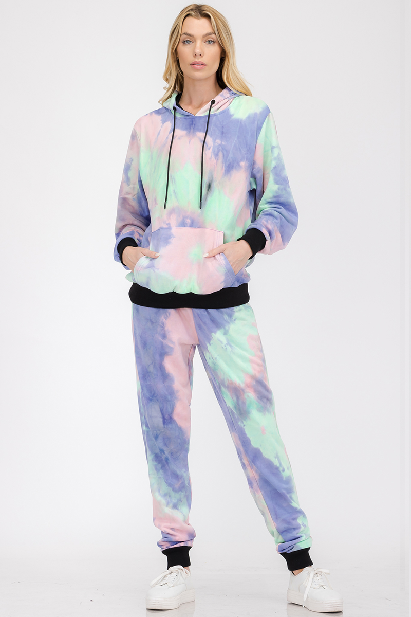 A stylish women's cotton tie dye lounge wear sweat set featuring a hoodie and sweatpants with black contrast cuffs and waist, perfect for casual wear.