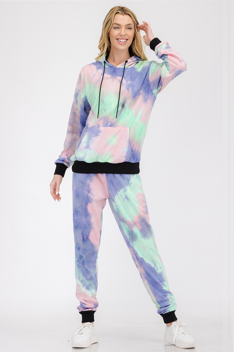 A stylish women's cotton tie dye lounge wear sweat set featuring a hoodie and sweatpants with black contrast cuffs and waist, perfect for casual wear.