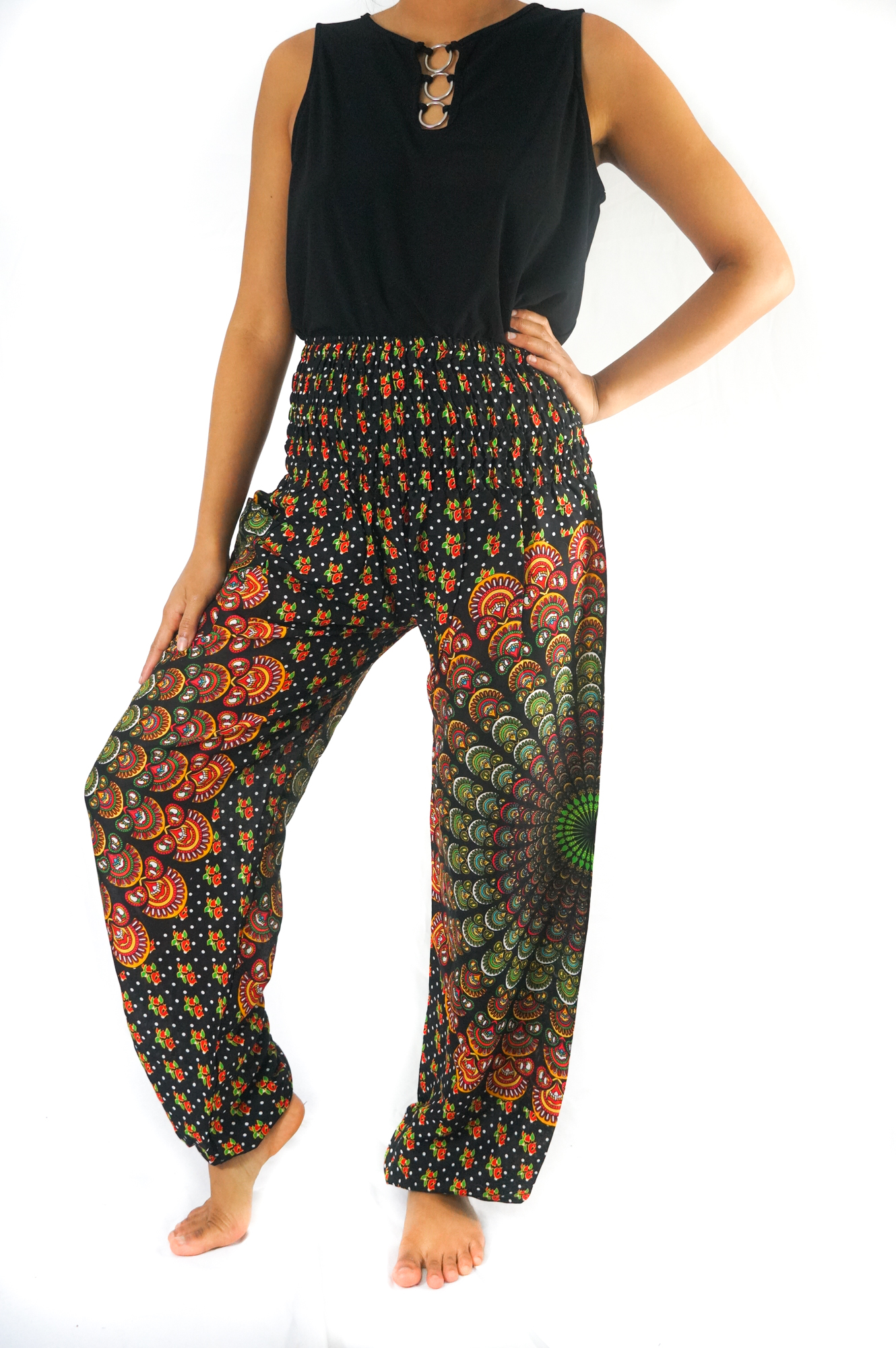 Black Chakra Harem Pants made of 100% rayon, featuring an elastic waist and ankle, designed for comfort and style.