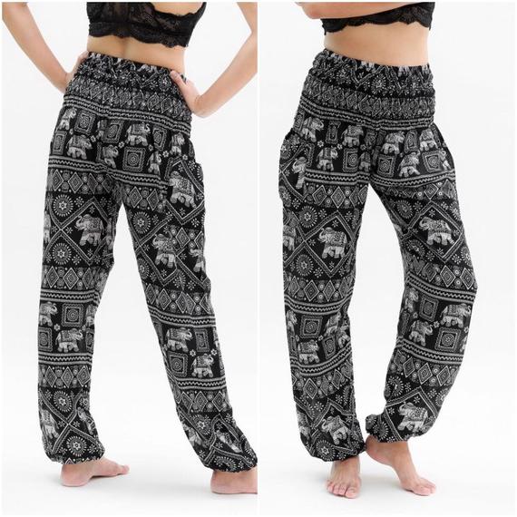 Black Elephant Boho Pants for women, made from 100% rayon, featuring an elastic waist and ankle, one side pocket, and a flowy design for comfort.