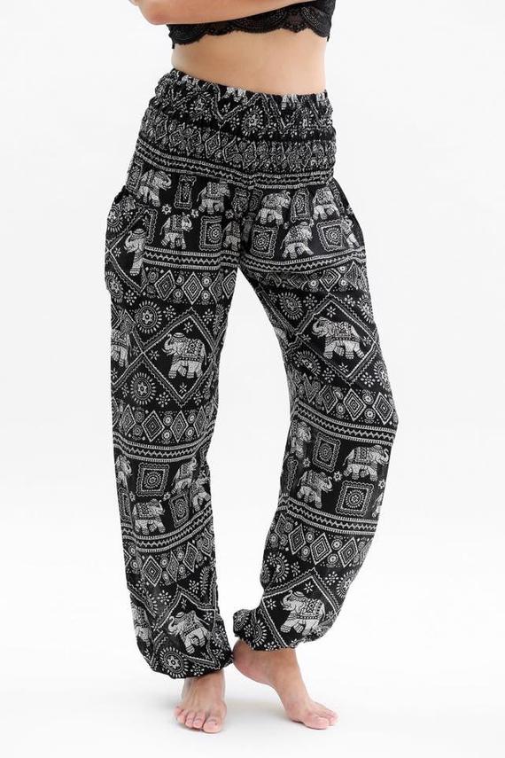 Black Elephant Boho Pants for women, made from 100% rayon, featuring an elastic waist and ankle, one side pocket, and a flowy design for comfort.
