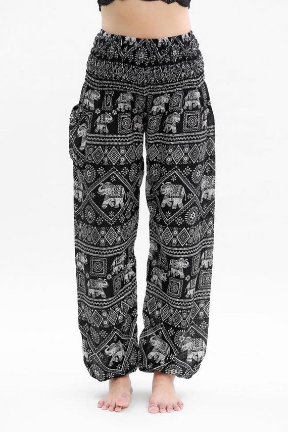 Black Elephant Boho Pants for women, made from 100% rayon, featuring an elastic waist and ankle, one side pocket, and a flowy design for comfort.