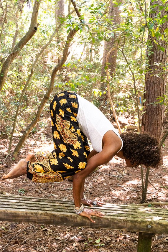 Black Elephant Boho Pants for women, featuring a loose fit, elastic waist, and vibrant patterns, perfect for yoga and casual wear.