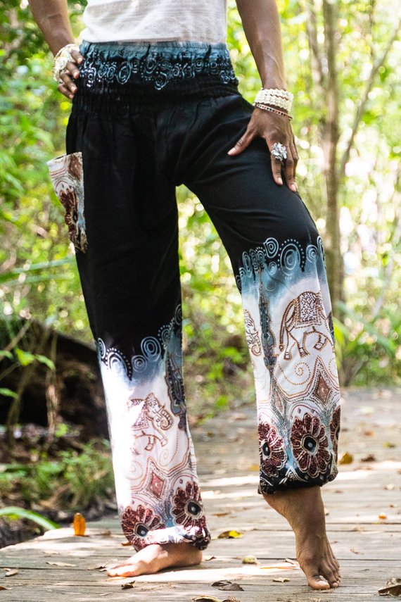 Black ELEPHANT Women Boho Pants made of 100% rayon, featuring an elastic waist and ankle, one side pocket, and vibrant bohemian patterns.