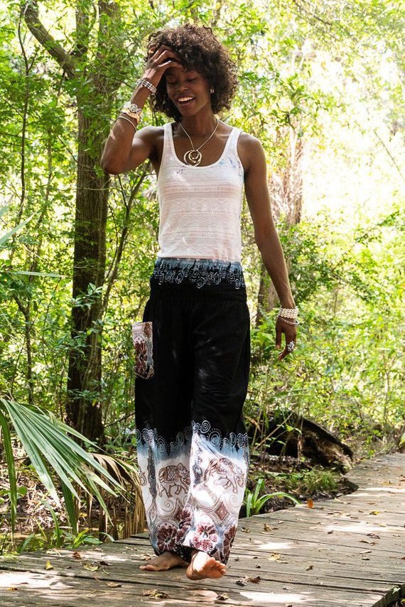 Black ELEPHANT Women Boho Pants made of 100% rayon, featuring an elastic waist and ankle, one side pocket, and vibrant bohemian patterns.