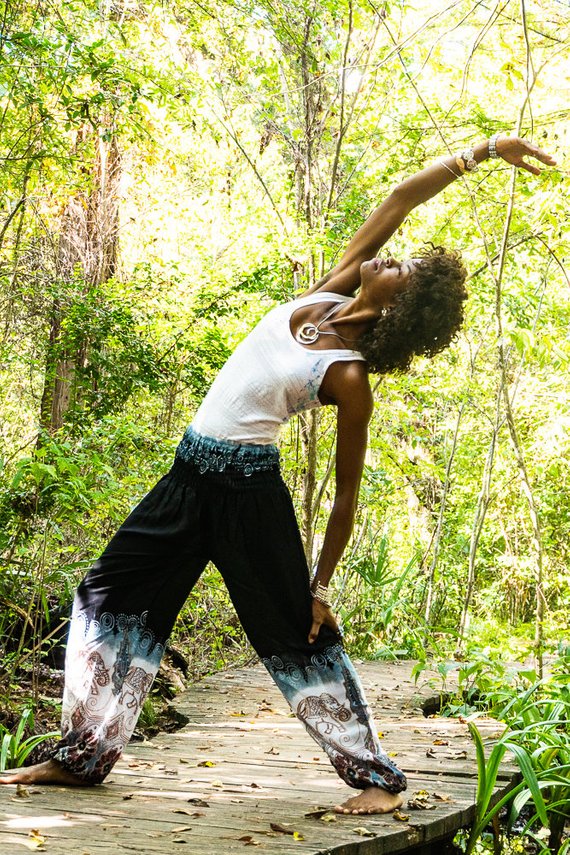 Black ELEPHANT Women Boho Pants made of 100% rayon, featuring an elastic waist and ankle, one side pocket, and vibrant bohemian patterns.