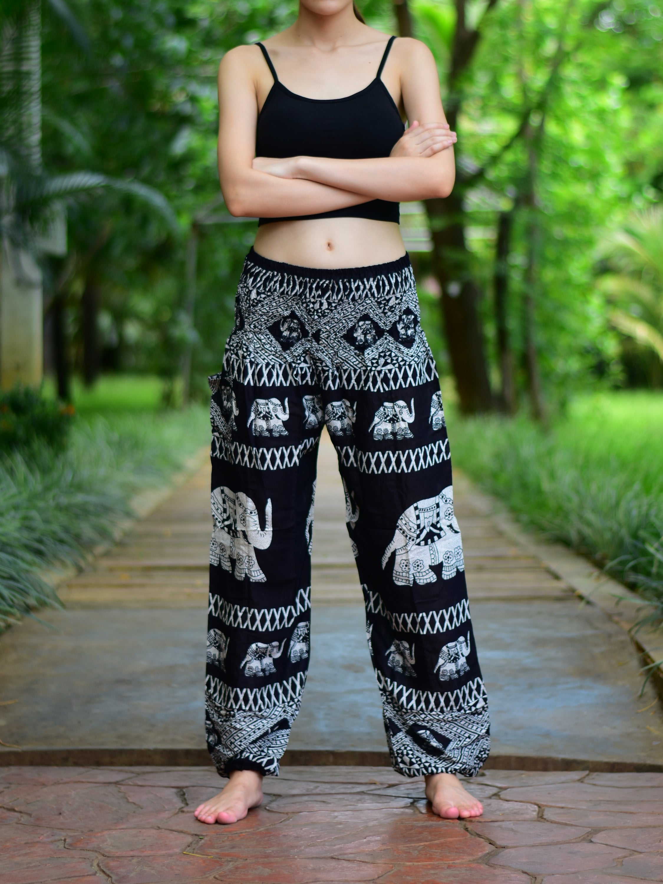 Bohotusk Black Elephant Bull Print Women's Trousers with elasticated smocked waist, showcasing vibrant colors and lightweight fabric.