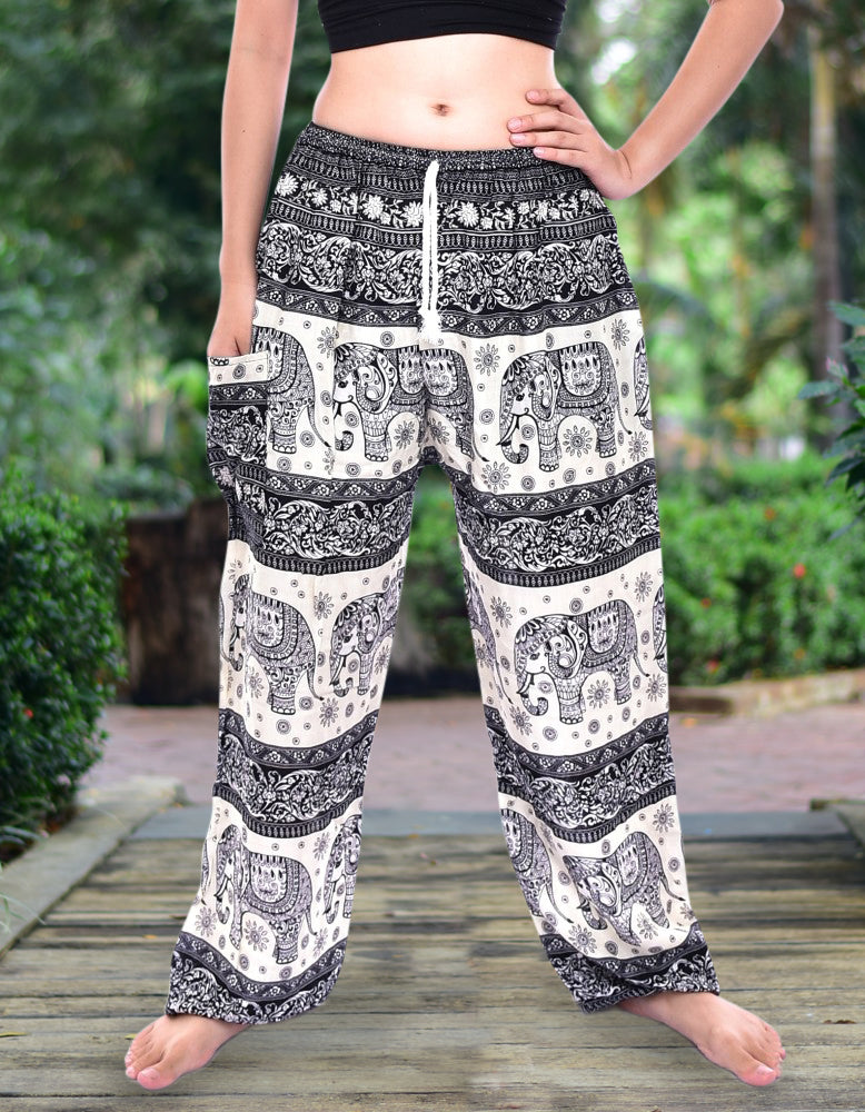 Bohotusk Black Elephant Herd Print Women's Harem Pants featuring a cord tie waist and elasticated ankles, showcasing a vibrant elephant print.